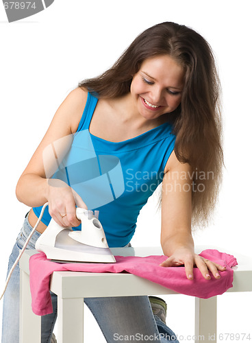 Image of happy woman with iron