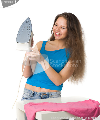 Image of happy woman with iron