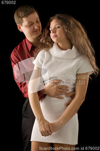 Image of Beautiful couple on black background