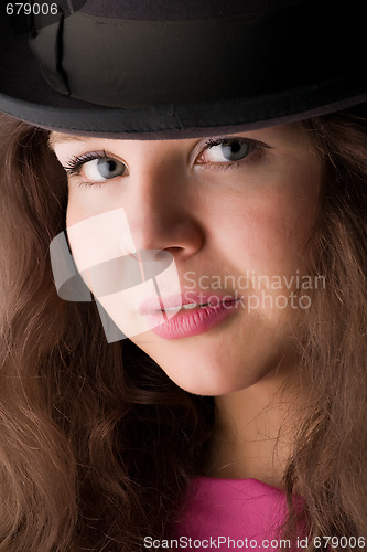 Image of beautiful girl  in hat