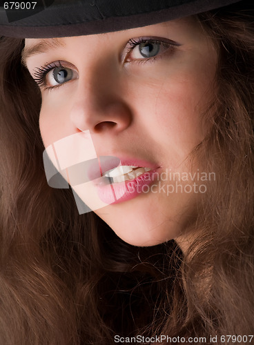 Image of beautiful girl  in hat