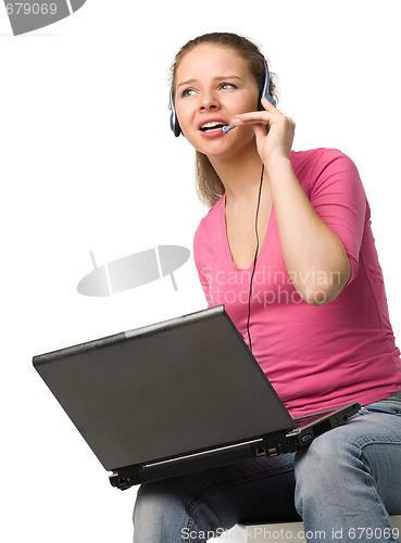 Image of girl with laptop and headset
