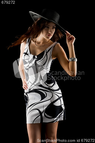 Image of Tempting girl on black background