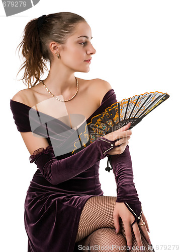Image of young woman with fan