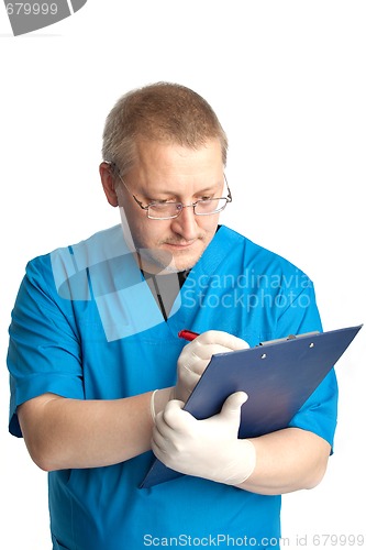 Image of doctor prepares report