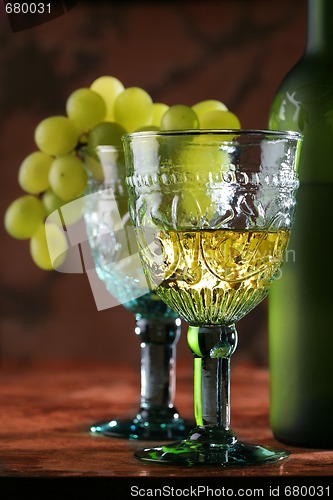 Image of golden wine in old-time goblet