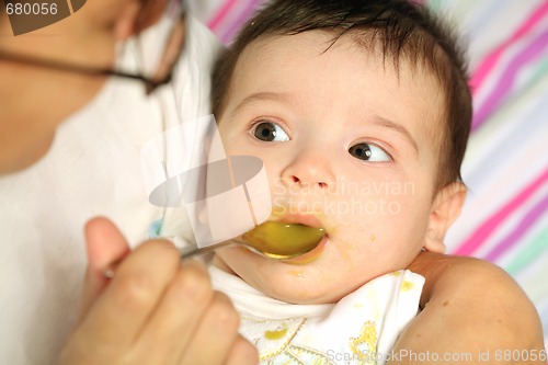 Image of infant eats the puree