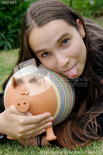 Image of Girl with piggy