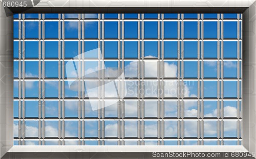 Image of blue sky through the bars