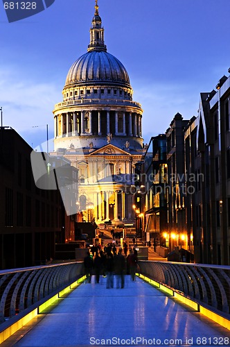 Image of St. Paul's Cathedral  from Millennium Bridge in London at night