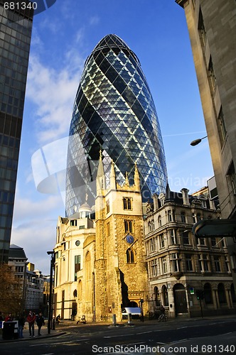 Image of Gherkin building and church of St. Andrew Undershaft in London