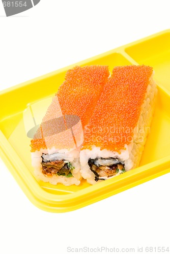 Image of Yellow plate with rolls of sushi