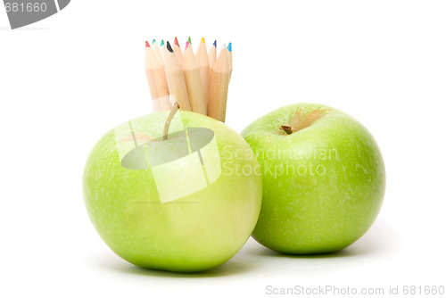 Image of Ripe apples fruit and color pencils 