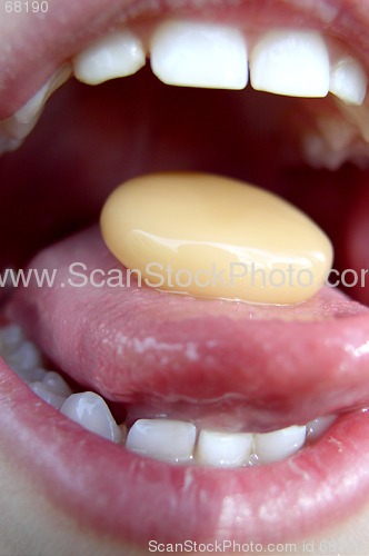 Image of Child's Mouth with Bonbon