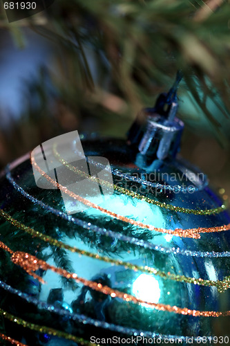 Image of Christmas ornaments on tree.