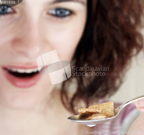 Image of Young people eating milk with cereals