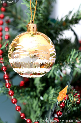 Image of Christmas ornaments on tree.