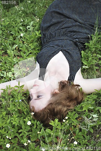 Image of the young woman on the glade