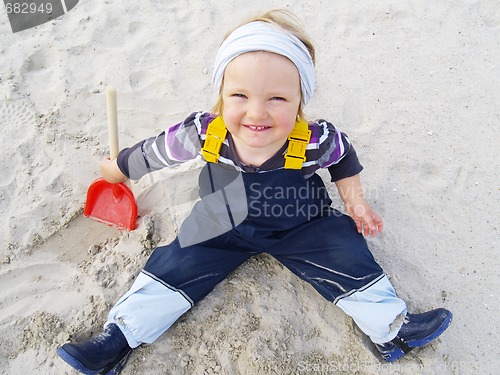 Image of girl in the sand