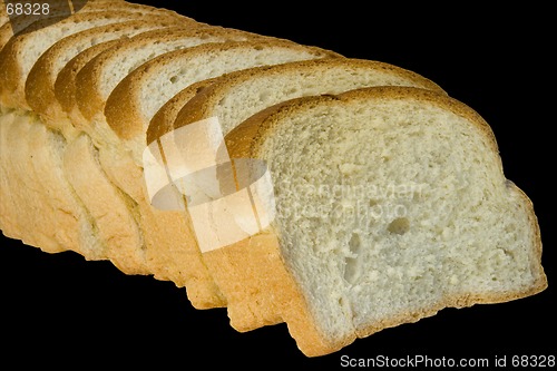 Image of Slices of bread isolated on black background with clipping path