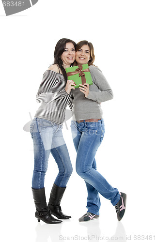 Image of Young WomenÕs holding a present
