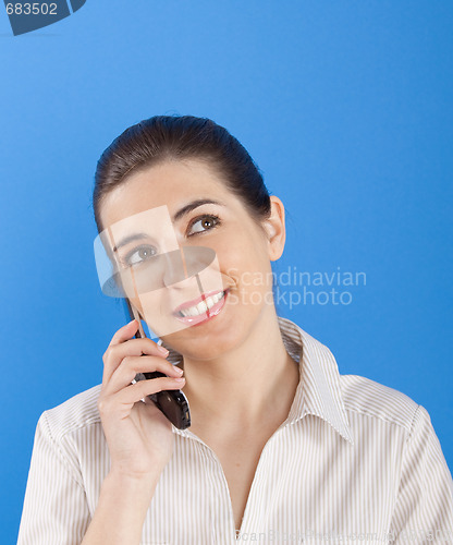 Image of Businesswoman calling at phone