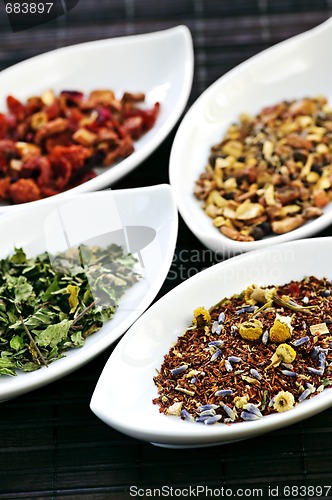 Image of Assorted herbal wellness dry tea in bowls