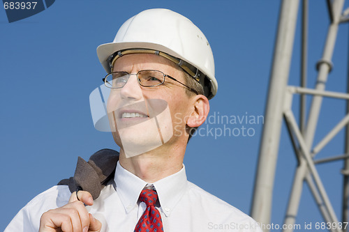 Image of Smiling engineer on construction site