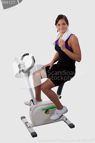 Image of Girl on exercise bike