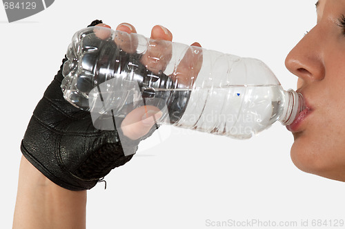 Image of Drinking from water bottle