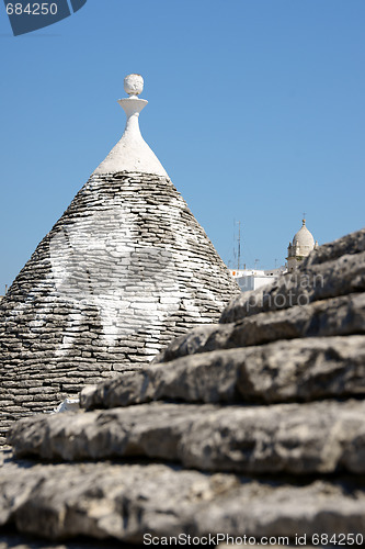 Image of Detail of Trulli house. Focus on background.