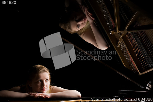 Image of Girl after a grand piano