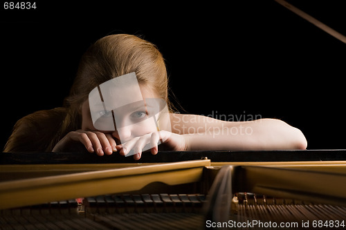 Image of Girl after a grand piano