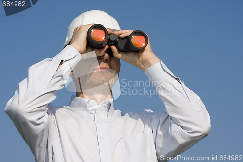 Image of Engineer searching with binocular