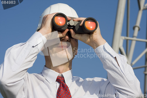 Image of Engineer with binoculars