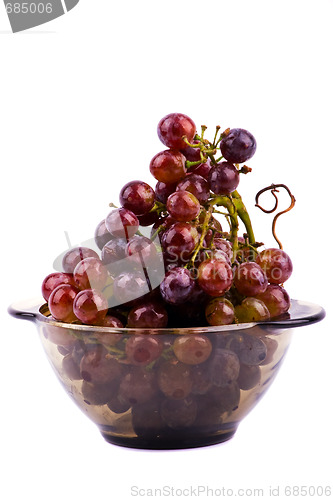 Image of Grapes in bowl isolated on white background