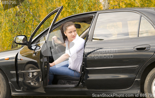 Image of woman in car