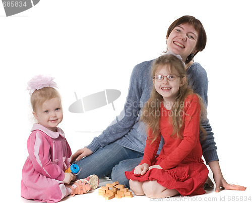 Image of mother plays with two daughters