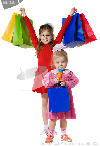 Image of Little girls with purchases