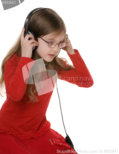 Image of Little girl in headsets