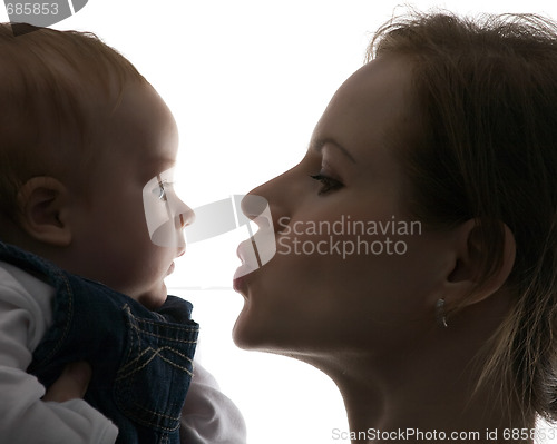 Image of mum kisses toddler