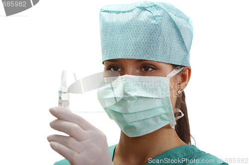 Image of Female doctor with a vial