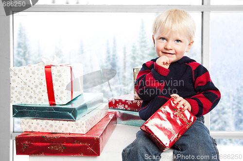 Image of Boy with christmas gift
