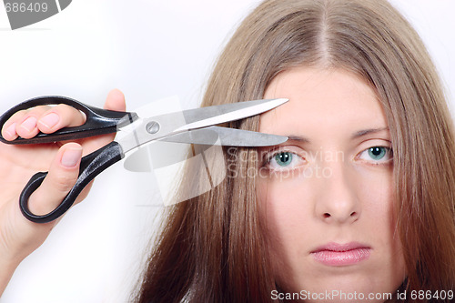 Image of The nice girl with scissors