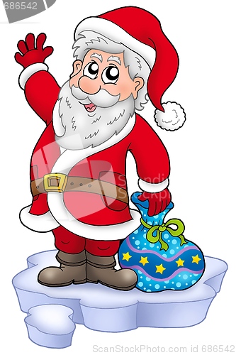 Image of Cute Santa Claus with gifts on snow