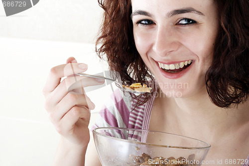 Image of Young people eating milk with cereals