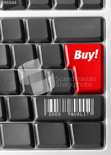 Image of Computer keyboard with blue "Buy" key