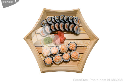 Image of sushi in wood plate