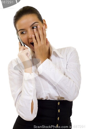 Image of attractive businesswomanon phone looking shoked