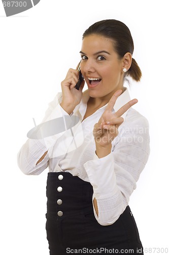 Image of woman with victory gesture and mobile phone